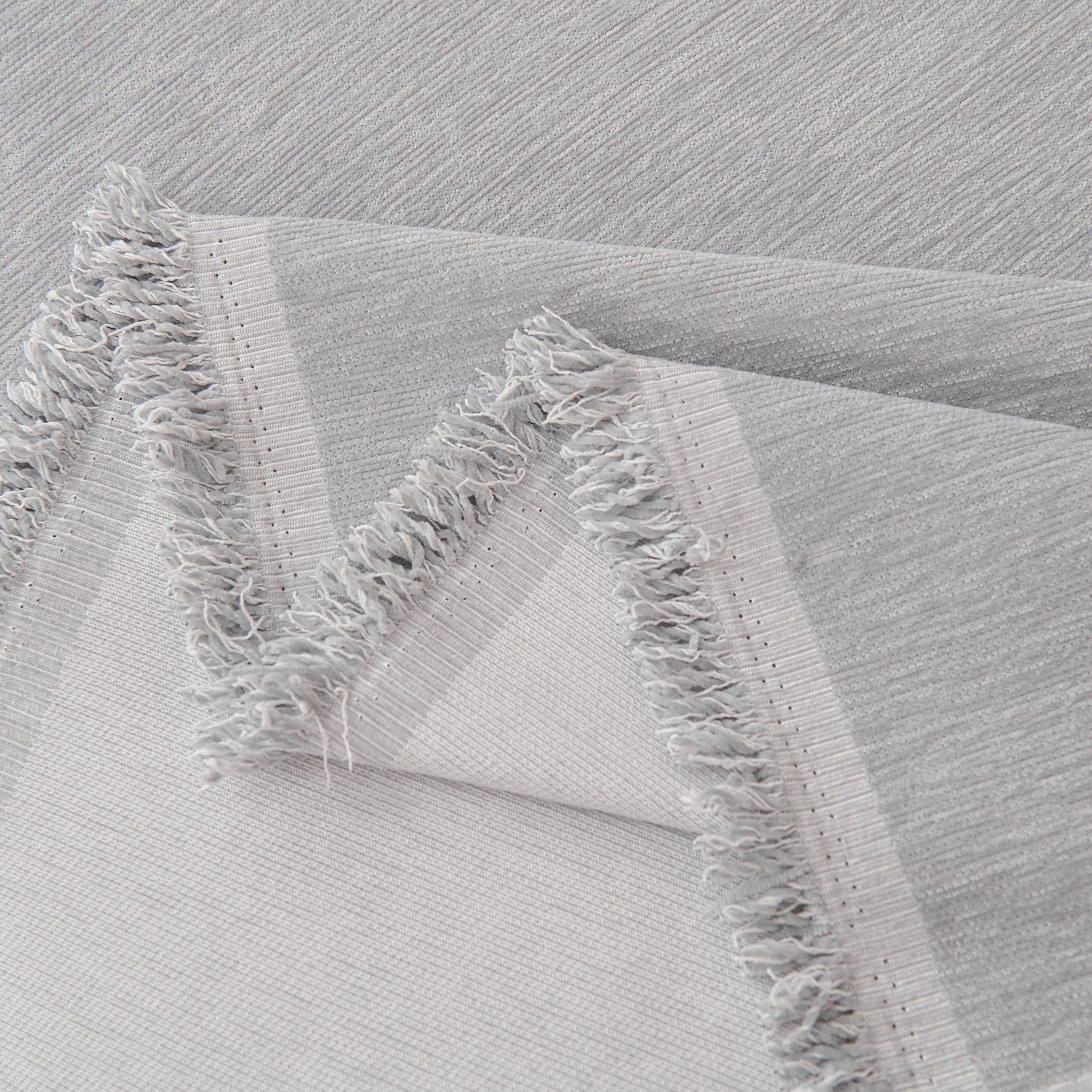 Textured Sofa Cover with Fringed Edges