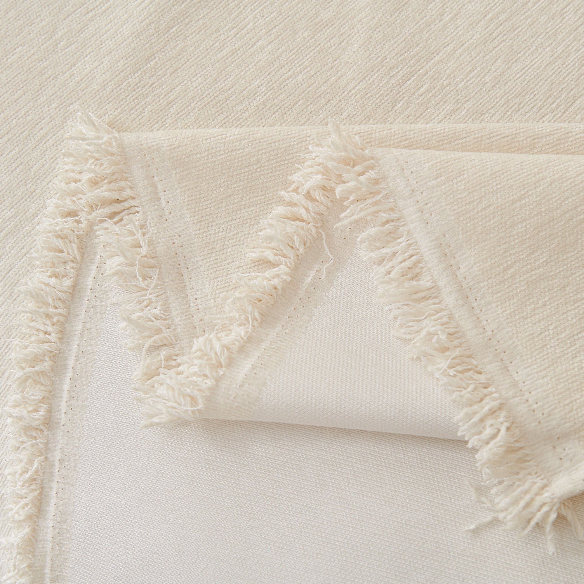 Textured Sofa Cover with Fringed Edges
